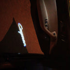 PORSCHE Cayenne  LOGO PROJECTOT LIGHTS Nr.09 (quantity  1 =  2 Logo Film /  2 door lights)