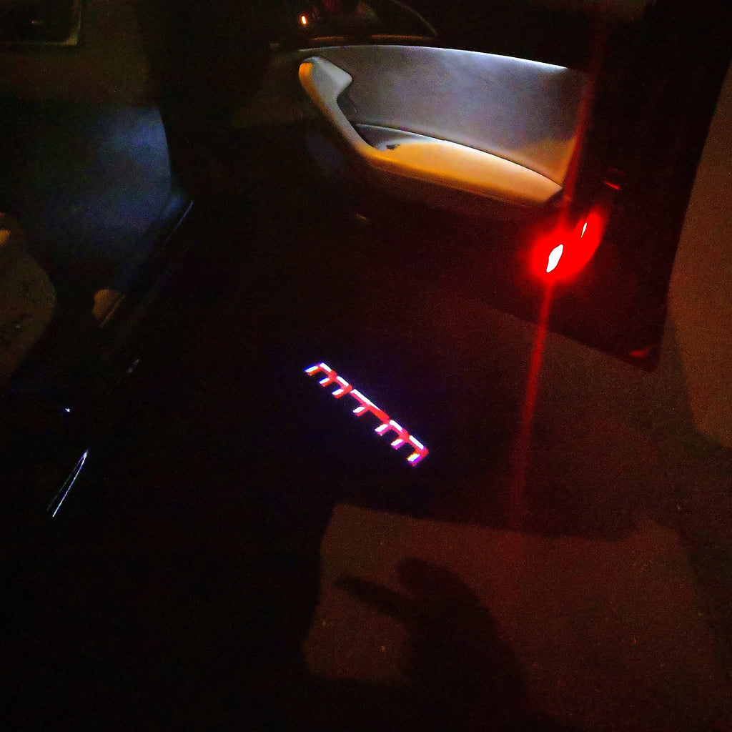 AUDI LOGO PROJECTOT LIGHTS Nr.91 (cantidad 1 = 2 películas con logotipo /2 luces de puerta)