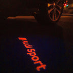 AUDI LOGO PROJECTOT LIGHTS Nr.111 (الكمية 1 = 2 Logo Films /2 أضواء الباب)