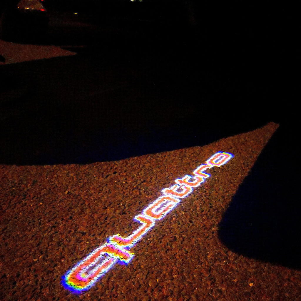 AUDI LOGO PROJECTOT LIGHTS Nr.95 (Menge 1 = 2 Logofolien /2 Türleuchten)