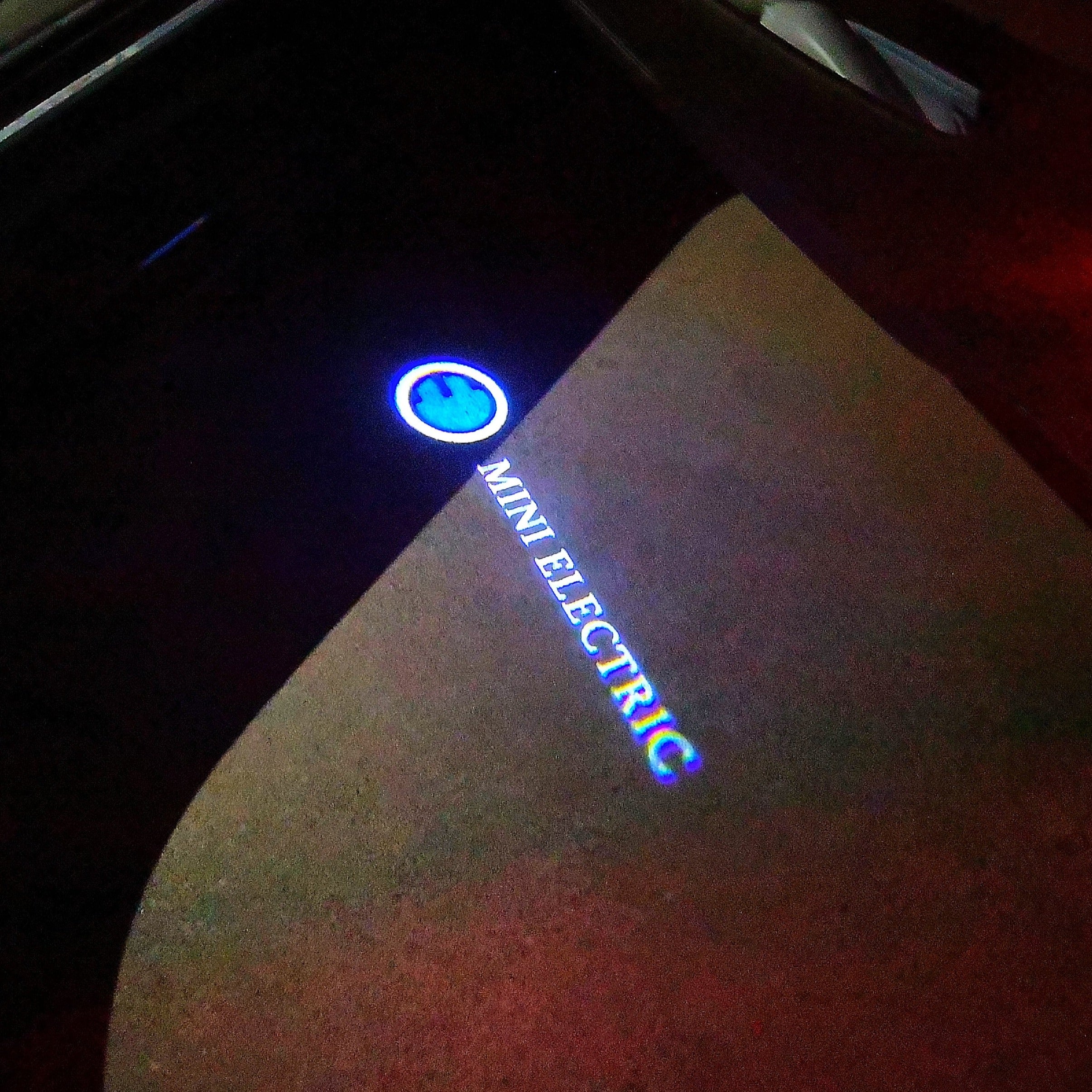 MINI LUCES ELÉCTRICAS DE PROYECTOR DE LOGOTIPO N ° 62 (cantidad 1 = 2 Película de Logo / 2 luces de puerta)