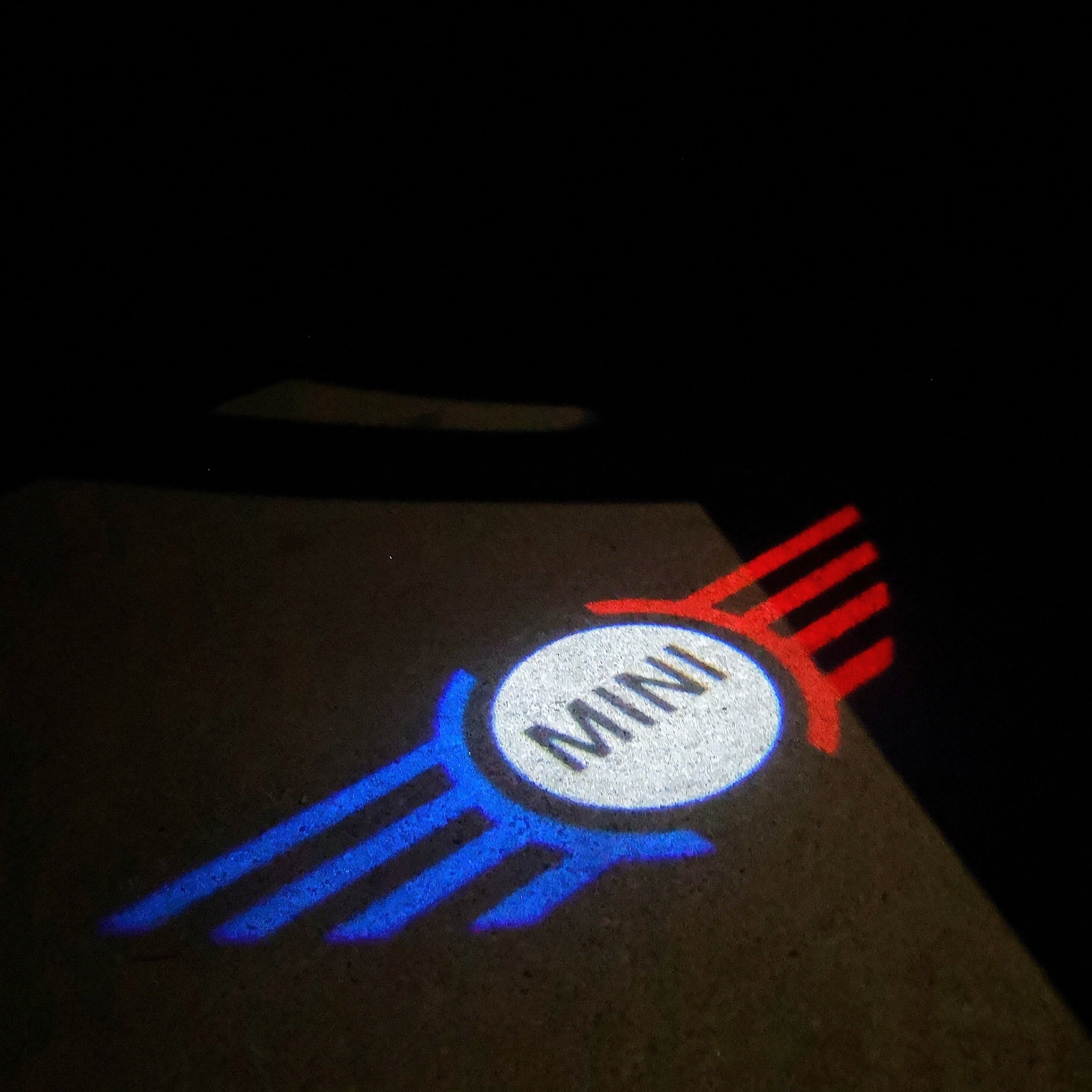 MINI ORIGINAL LOGO PROJECROTR LIGHTS  (quantity  1 =  2 Logo Film /  2 door lights)  Nr.mini001