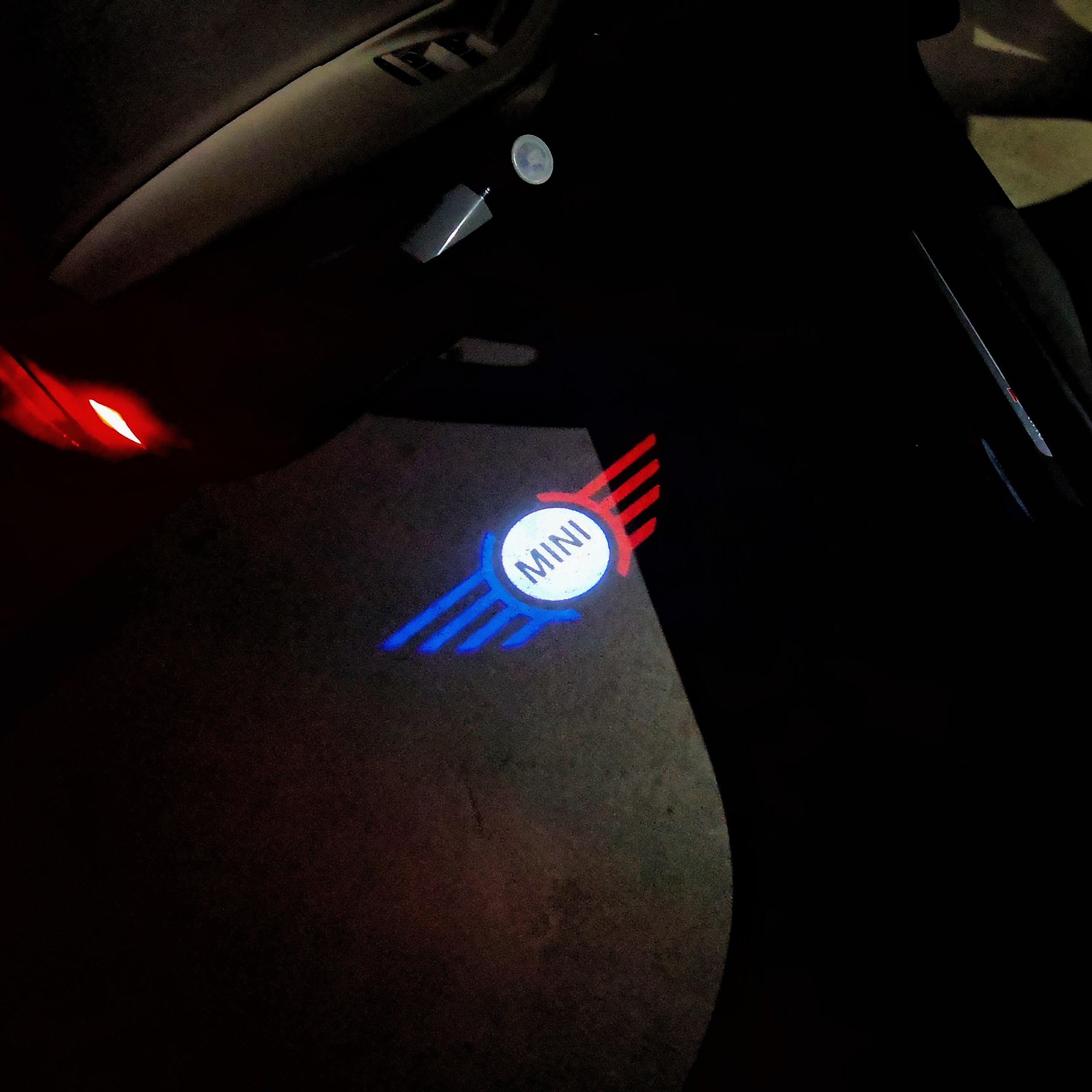 MINI ORIGINAL LOGO PROJECROTR LIGHTS  (quantity  1 =  2 Logo Film /  2 door lights)  Nr.mini001