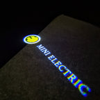 MINI ELECTRIC LOGO PROJECROTR LIGHTS Nr.63 (Menge 1 = 2 Logo Film / 2 Türleuchten)