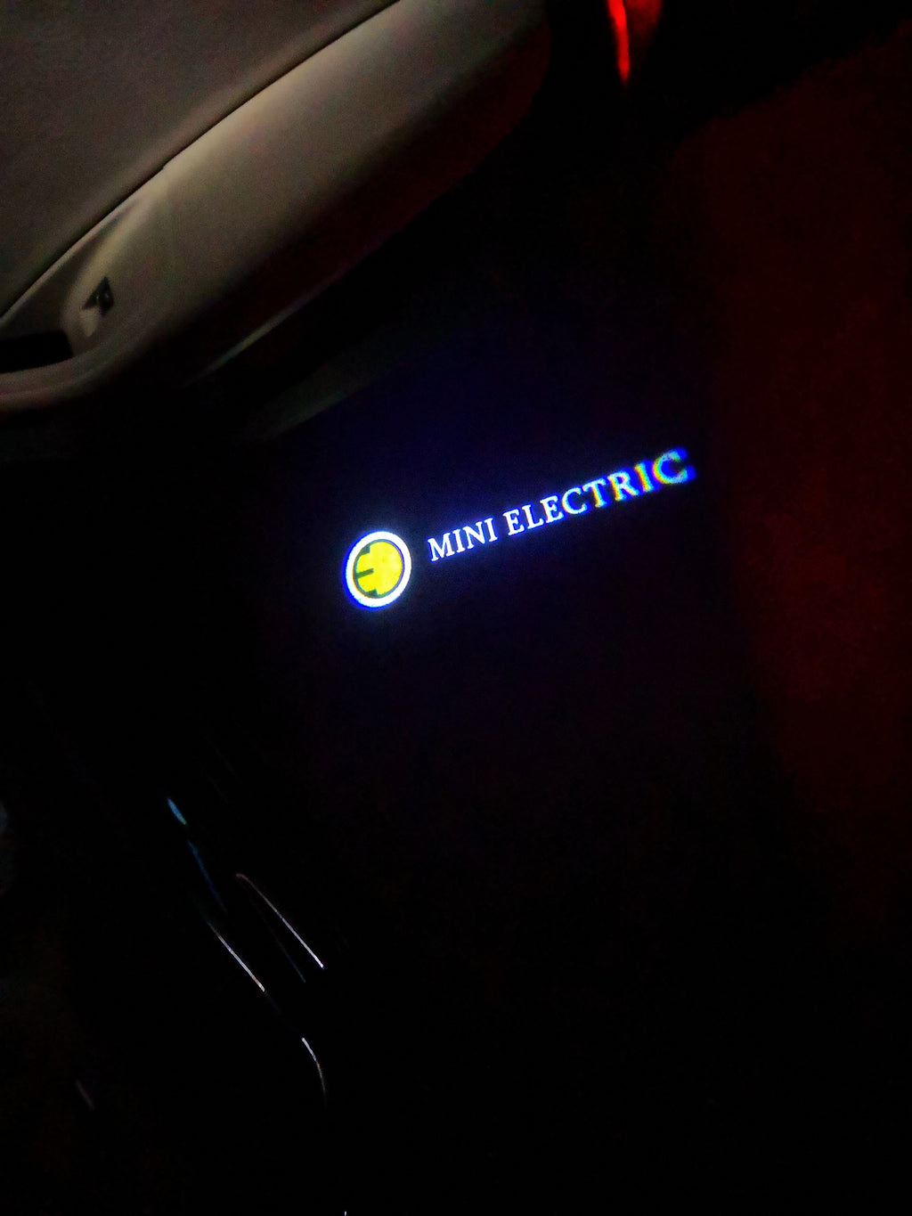 MINI ELECTRIC LOGO PROJECROTR LIGHTS Nr.63 (Menge 1 = 2 Logo Film / 2 Türleuchten)