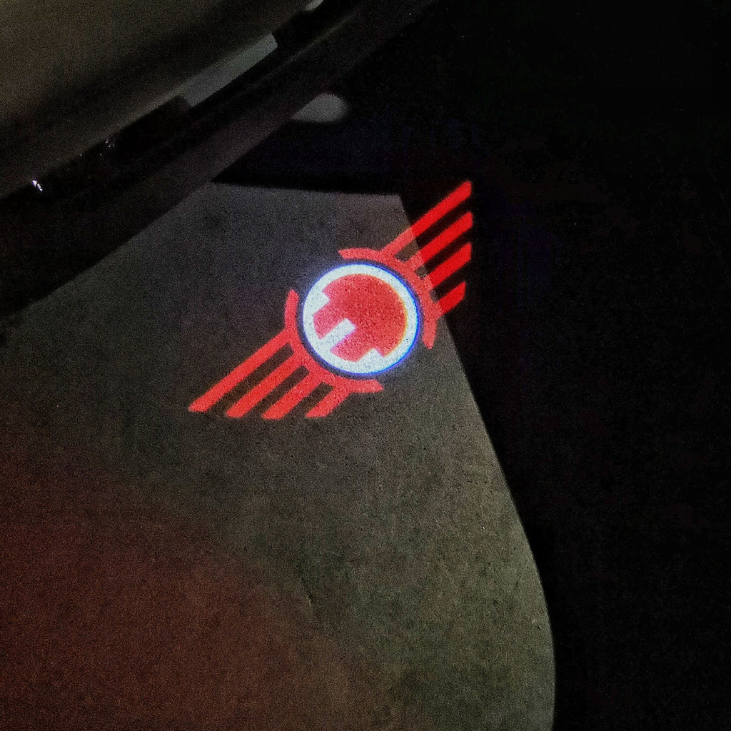 MINI ELECTRIC LOGO PROJECROTR LIGHTS Nr.99 (Menge 1 = 2 Logo Film / 2 Türleuchten)