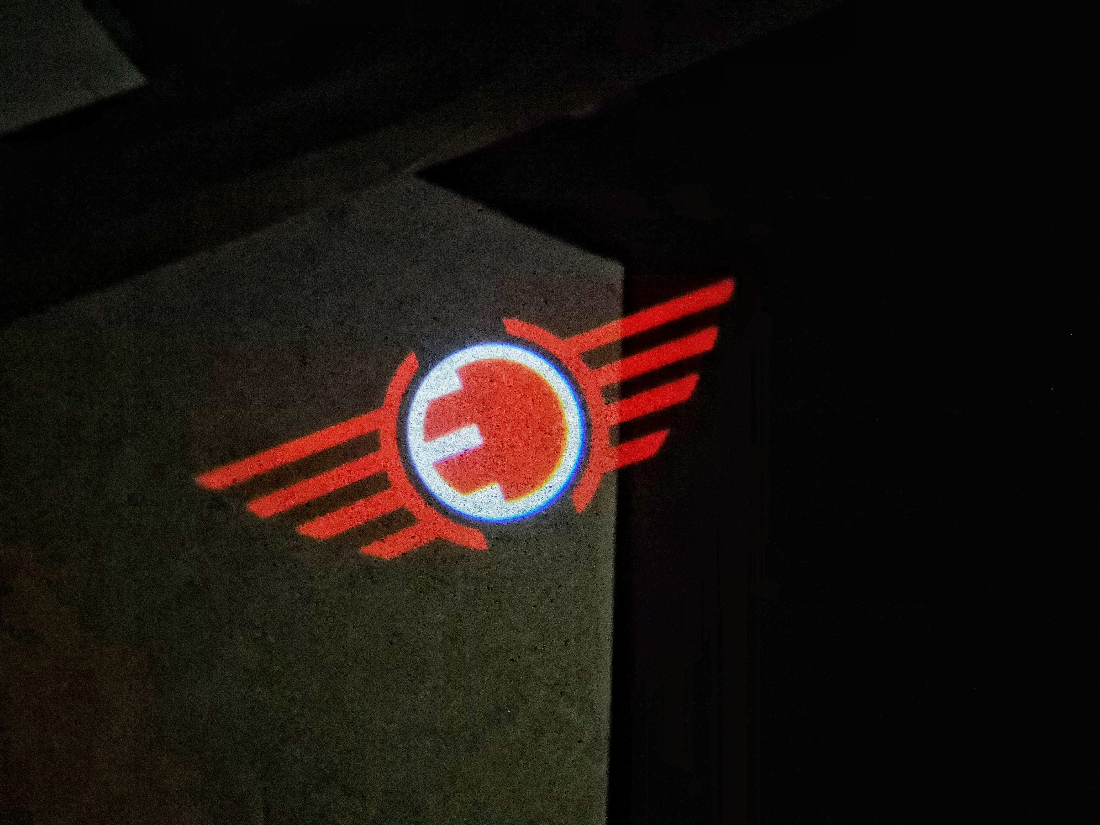 MINI ELECTRIC LOGO PROJECROTR LIGHTS Nr.99 (Menge 1 = 2 Logo Film / 2 Türleuchten)