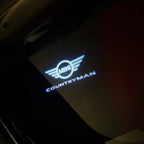 LUCES DE PROYECTOR CON LOGO MINI COUNTRYMAN Nr.131 (cantidad 1 = 2 Película de Logo / 2 luces de puerta)