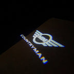 LUCES DE PROYECTOR CON LOGO MINI COUNTRYMAN Nr.131 (cantidad 1 = 2 Película de Logo / 2 luces de puerta)