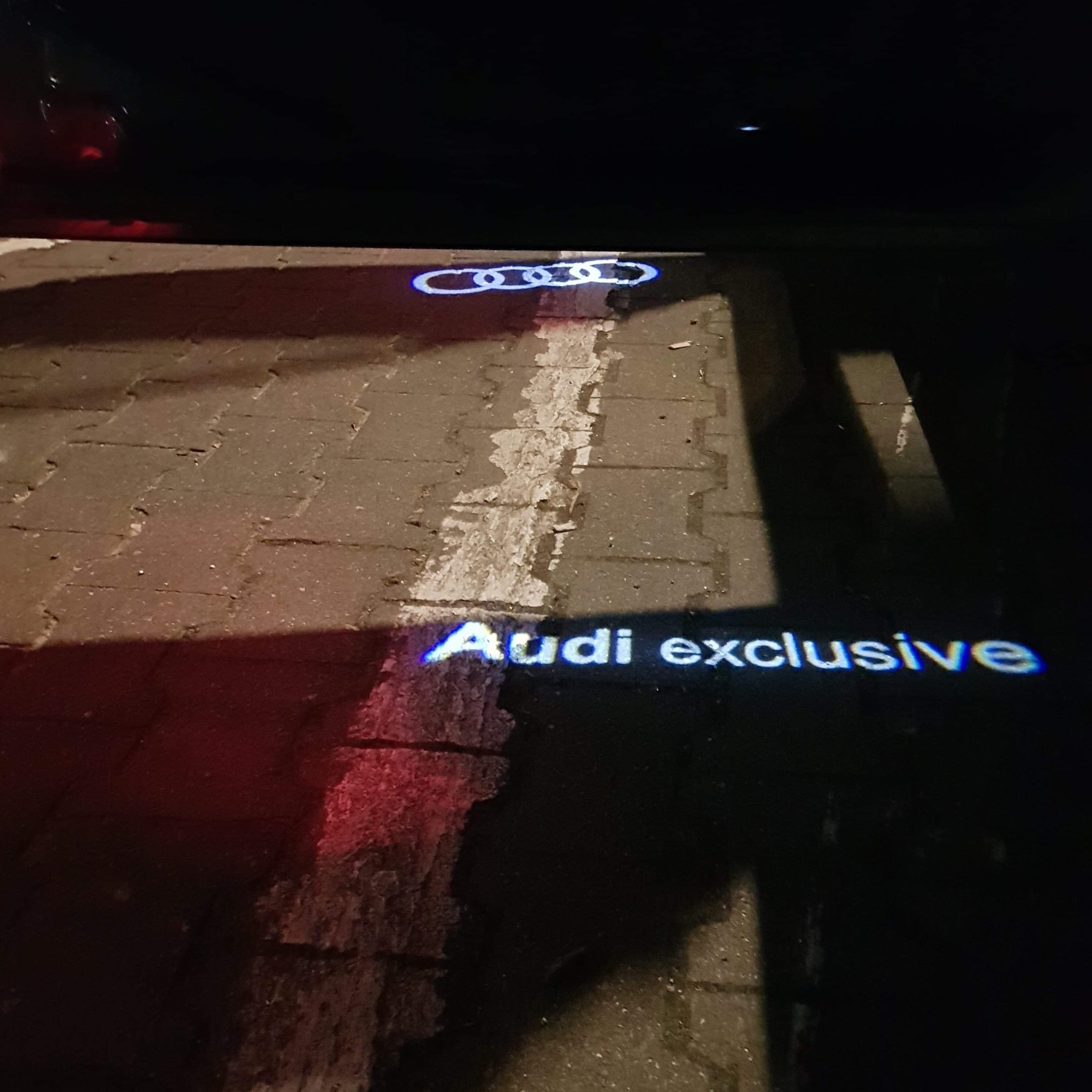 AUDI LOGO PROJECTOT LIGHTS Nr.73 (Menge 1 = 2 Logofolien /2 Türleuchten)