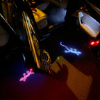 LUCI PROIETTORI AUDI QUATTRO GECKO LOGO Nr.66 (quantità 1 = 2 Pellicole Logo / 2 luci porta)
