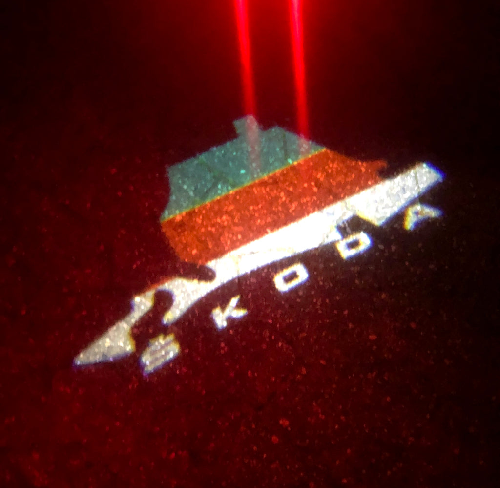 SKODA LOGO PROJECTOR LIGHTS Nr.48 (Menge 1 = 2 Logo Film / 2 Türlichter)