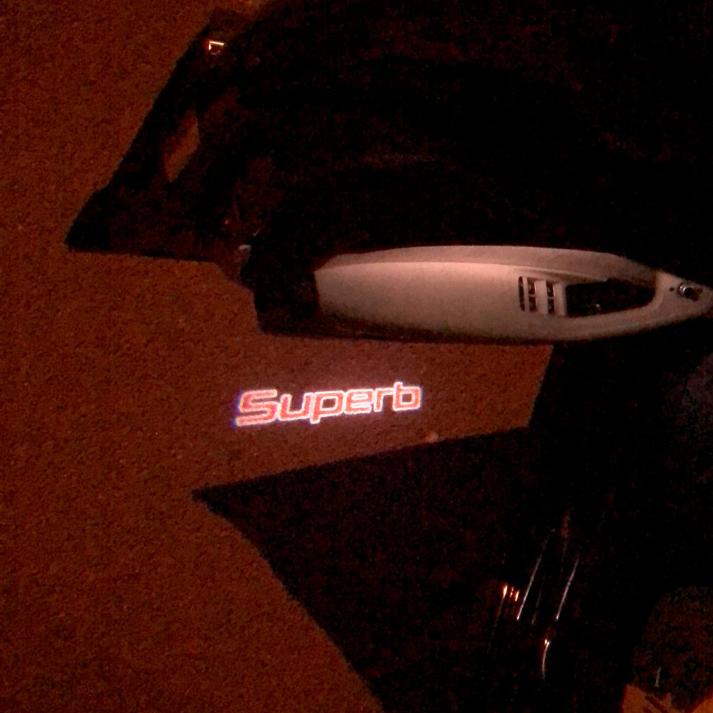 SKODA LOGO PROJECTOT LIGHTS Nr.91 (quantità 1 = 2 Logo Film / 2 luci porta)