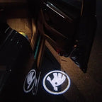SKODA ORIGINAL LOGO PROJECTOT LIGHTS Nr.17(quantity  1 =  2 Logo Film /  2 door lights)