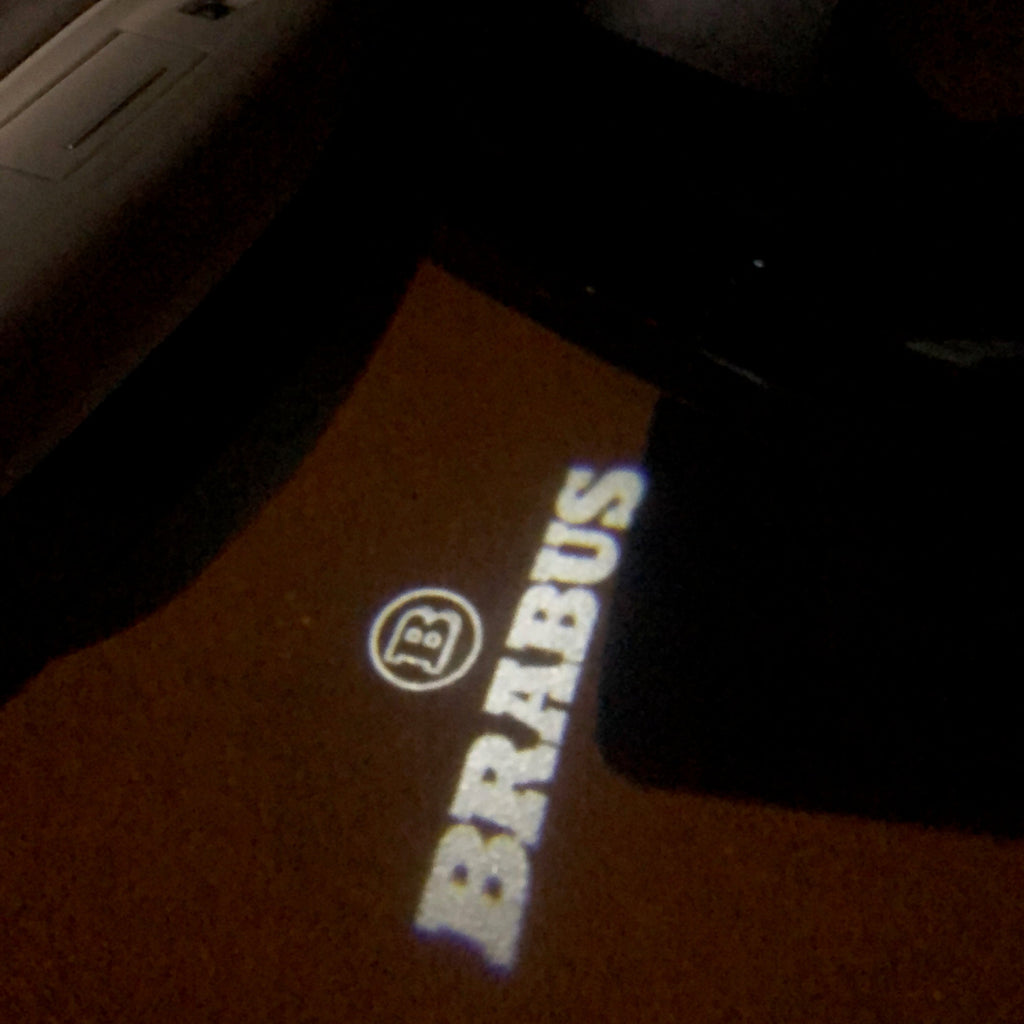 LUCES DE PROYECTOR LOGO MERCEDES BENZ BRABUS Nr.24 (cantidad 1 = 1 juegos / 2 luces de puerta)