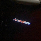 AUDI LOGO PROJECTOT LIGHTS Nr.87 (Menge 1 = 2 Logofolien /2 Türleuchten)