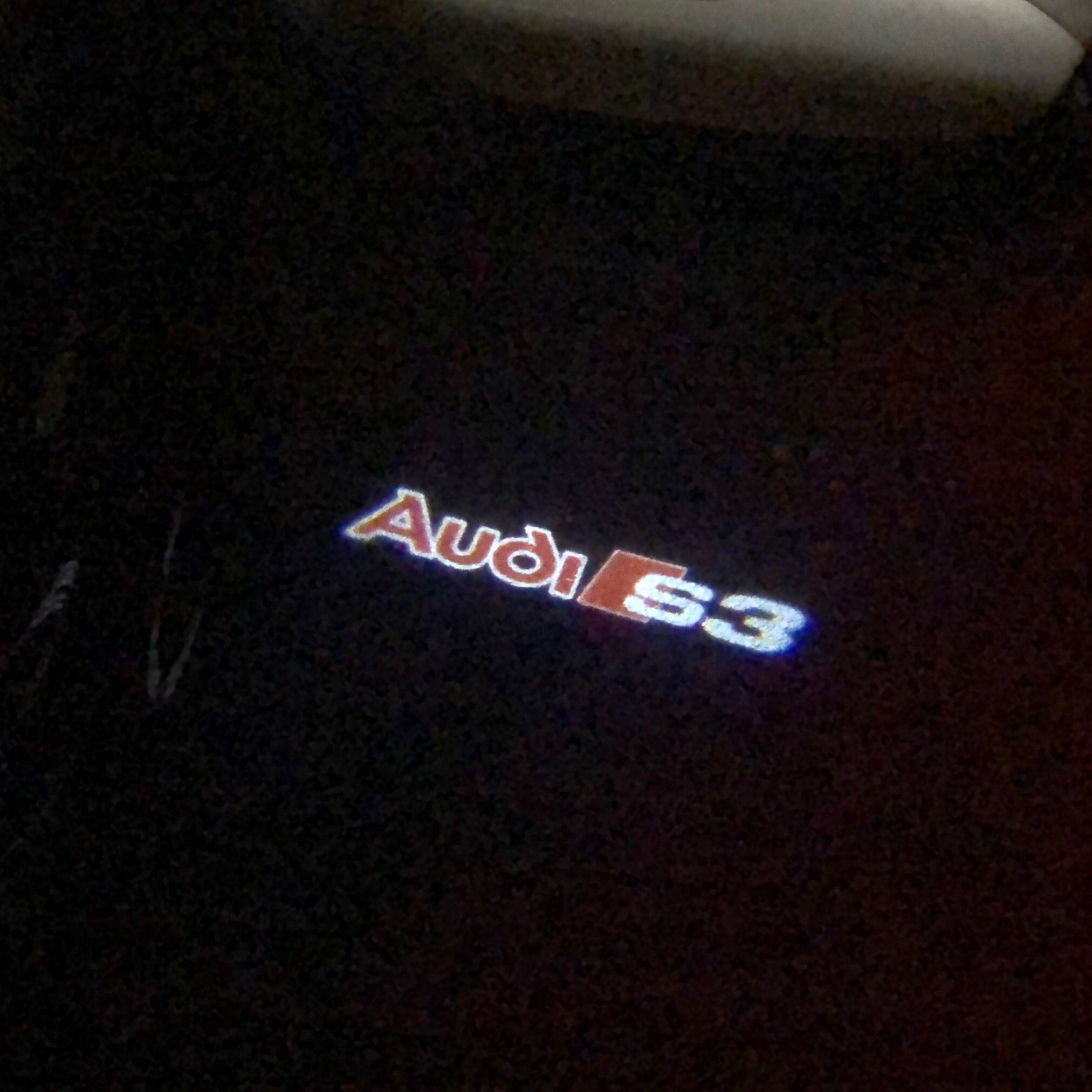 AUDI LOGO PROJECTOT LIGHTS Nr.87 (Menge 1 = 2 Logofolien /2 Türleuchten)