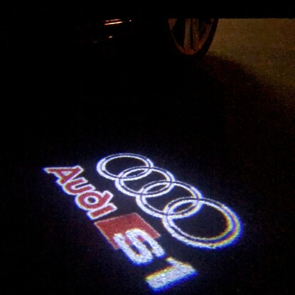 AUDI LOGO PROJECTOT LIGHTS Nr.32 (Menge 1 = 2 Logofolien /2 Türleuchten)