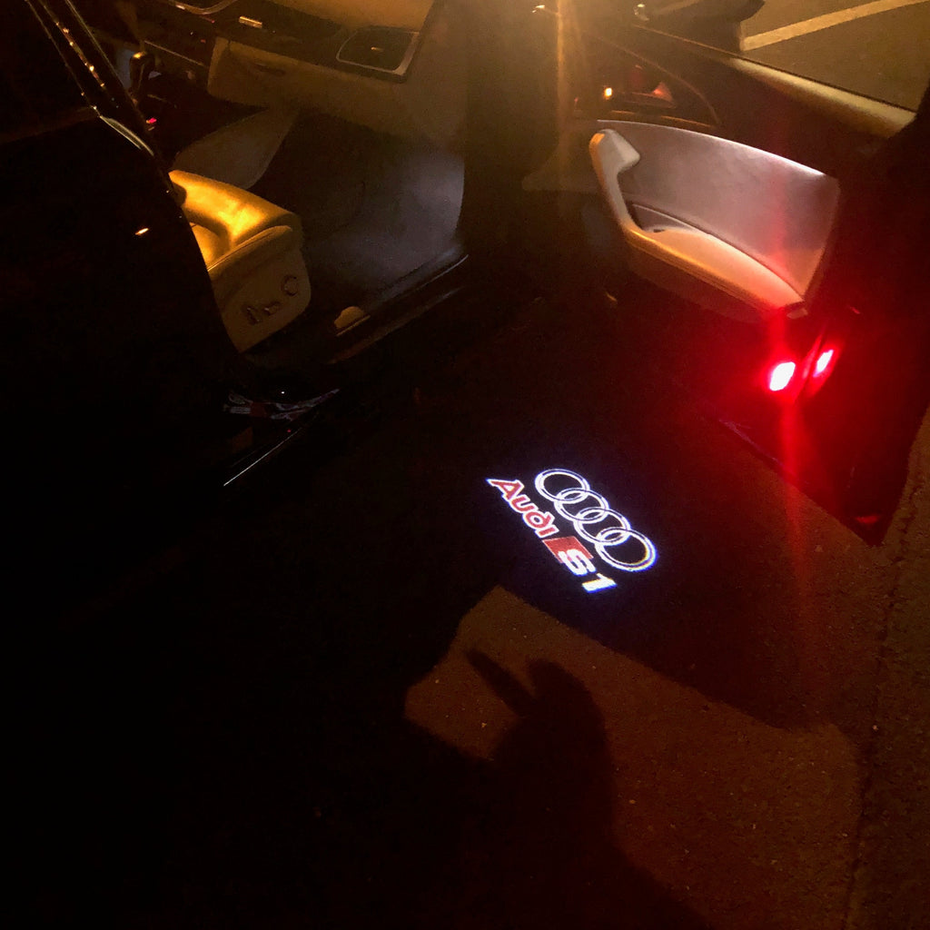 AUDI LOGO PROJECTOT LIGHTS Nr.32 (Menge 1 = 2 Logofolien /2 Türleuchten)