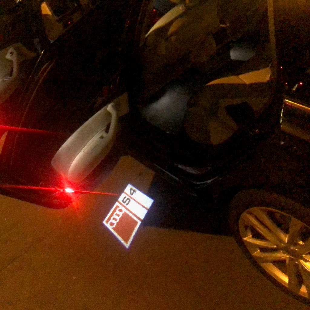 AUDI LOGO PROJECTOT LIGHTS Nr.151 (Menge 1 = 2 Logofolien /2 Türleuchten)