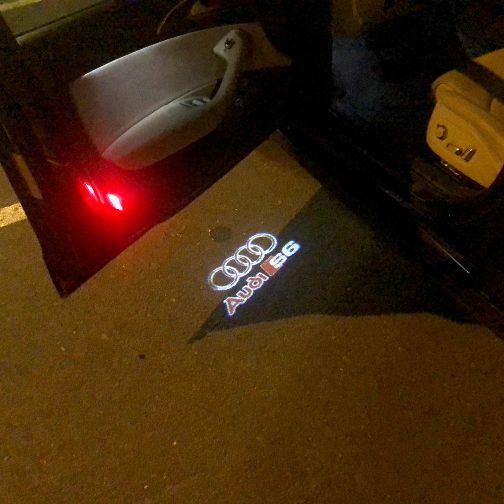 AUDI LOGO PROJECTOT LIGHTS Nr.36 (Menge 1 = 2 Logofolien /2 Türleuchten)