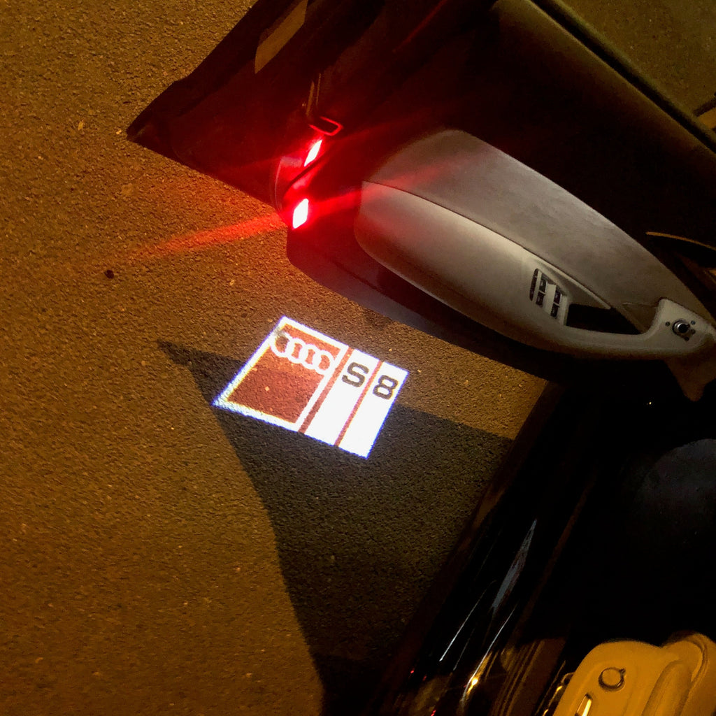 AUDI LOGO PROJECTOT LIGHTS Nr.149 (Menge 1 = 2 Logofolien /2 Türleuchten)