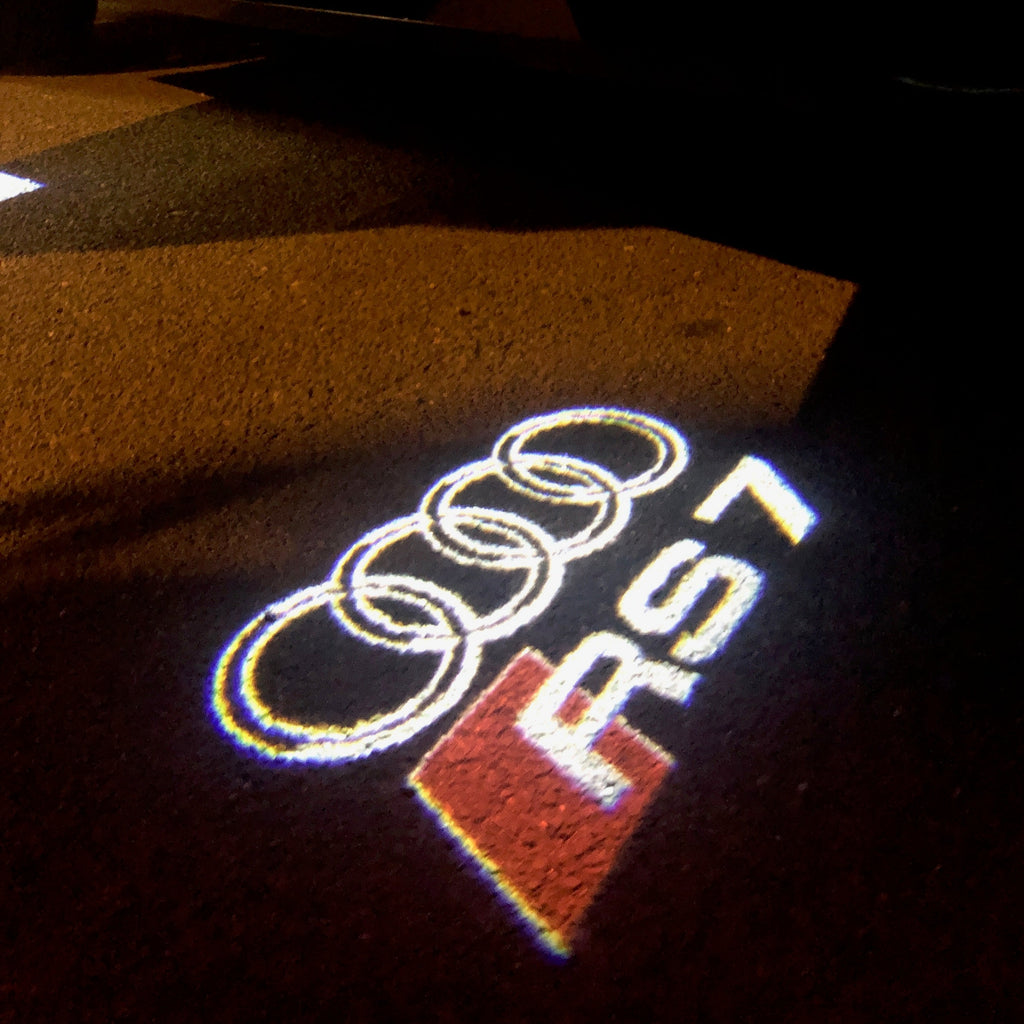 AUDI LOGO PROJECTOT LIGHTS Nr.138 (Menge 1 = 2 Logofolien /2 Türleuchten)