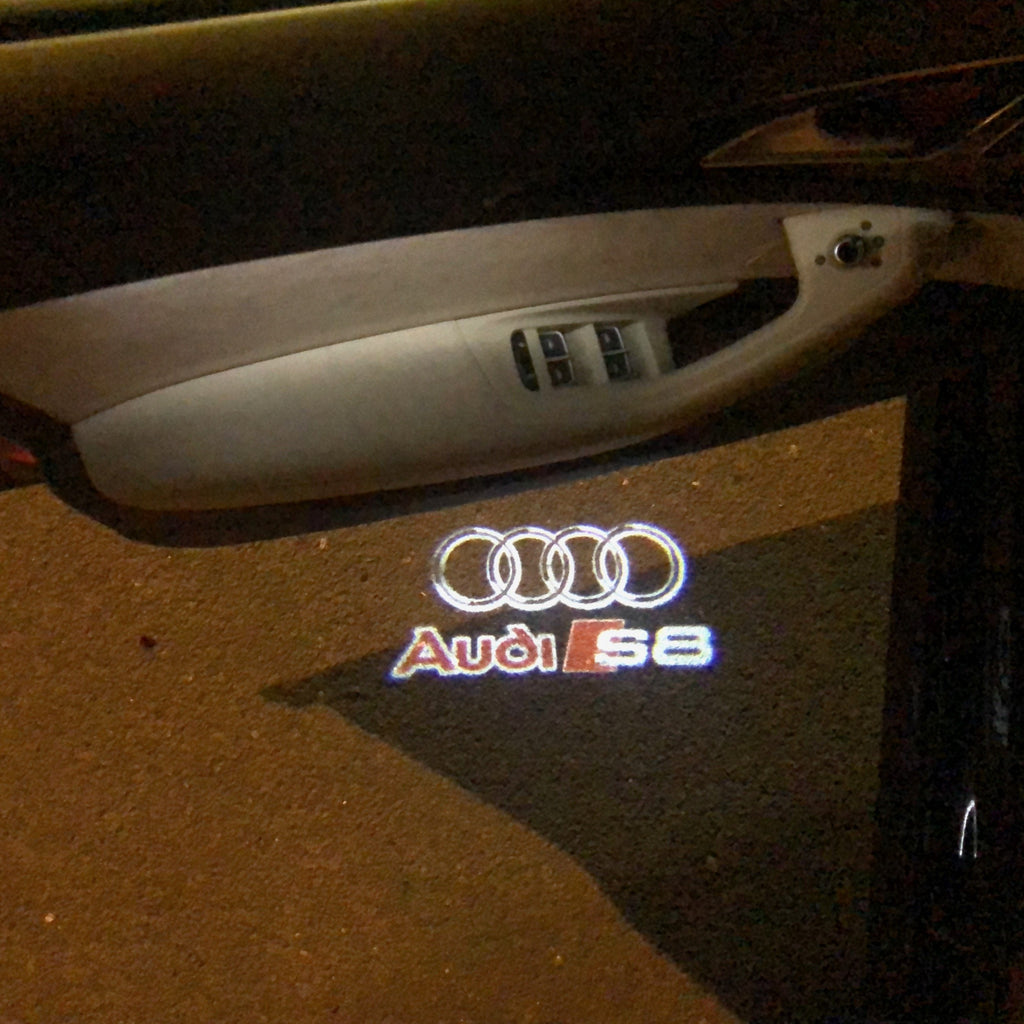 AUDI S8 LOGO PROJECTOT LIGHTS Nr.38 (Menge 1 = 2 Logofolien /2 Türleuchten)