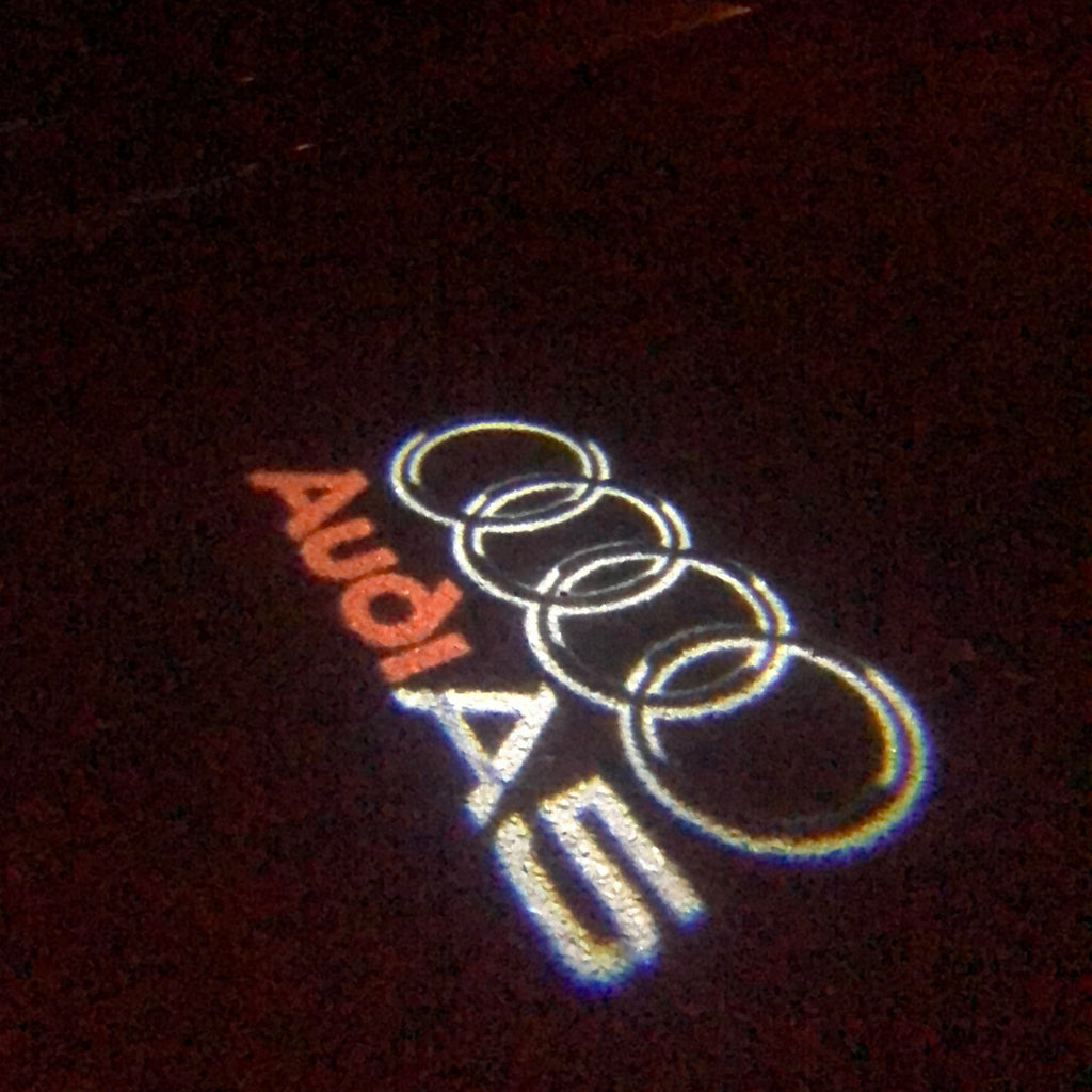 AUDI LOGO PROJECTOT LIGHTS Nr.43 (Menge 1 = 2 Logofolien /2 Türleuchten)