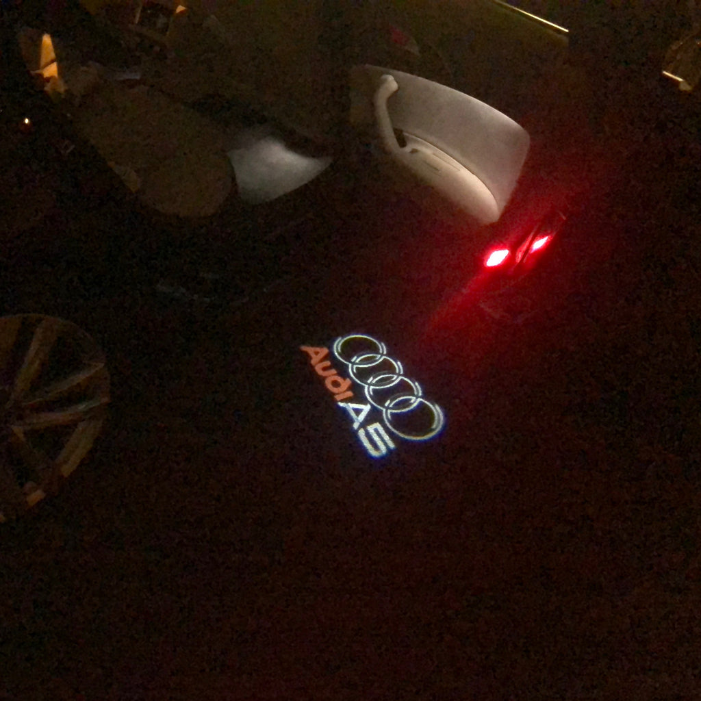 AUDI LOGO PROJECTOT LIGHTS Nr.43 (Menge 1 = 2 Logofolien /2 Türleuchten)