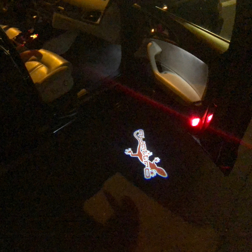 AUDI QUATTRO GECKO LOGO PROJECTOT LIGHTS Nr.63 (quantità 1 = 2 Logo Films /2 luci porta)