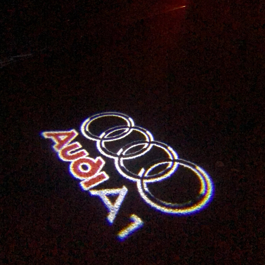 AUDI LOGO PROJECTOT LIGHTS Nr.125 (quantité 1 = 2 Logo Films /2 feux de porte)