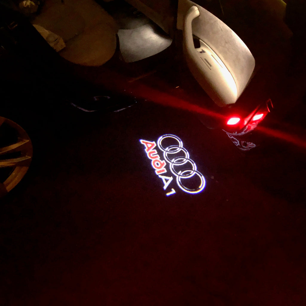 AUDI LOGO PROJECTOT LIGHTS Nr.125 (quantité 1 = 2 Logo Films /2 feux de porte)