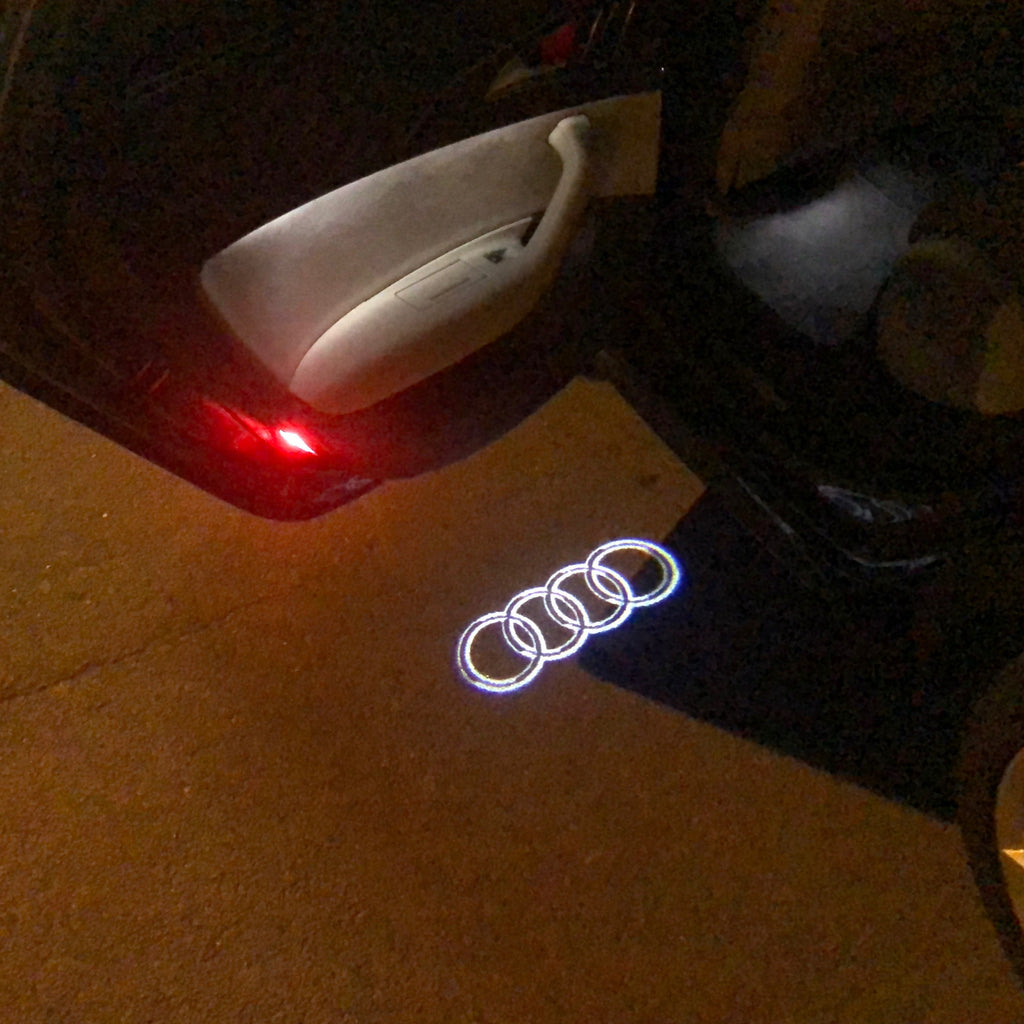 AUDI RING LOGO PROJECTOT LIGHTS Nr.09 (Menge 1 = 2 Logofolien /2 Türleuchten)
