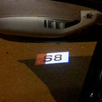 AUDI LOGO PROJECTOT LIGHTS Nr.135 (الكمية 1 = 2 Logo Films /2 أضواء الباب)