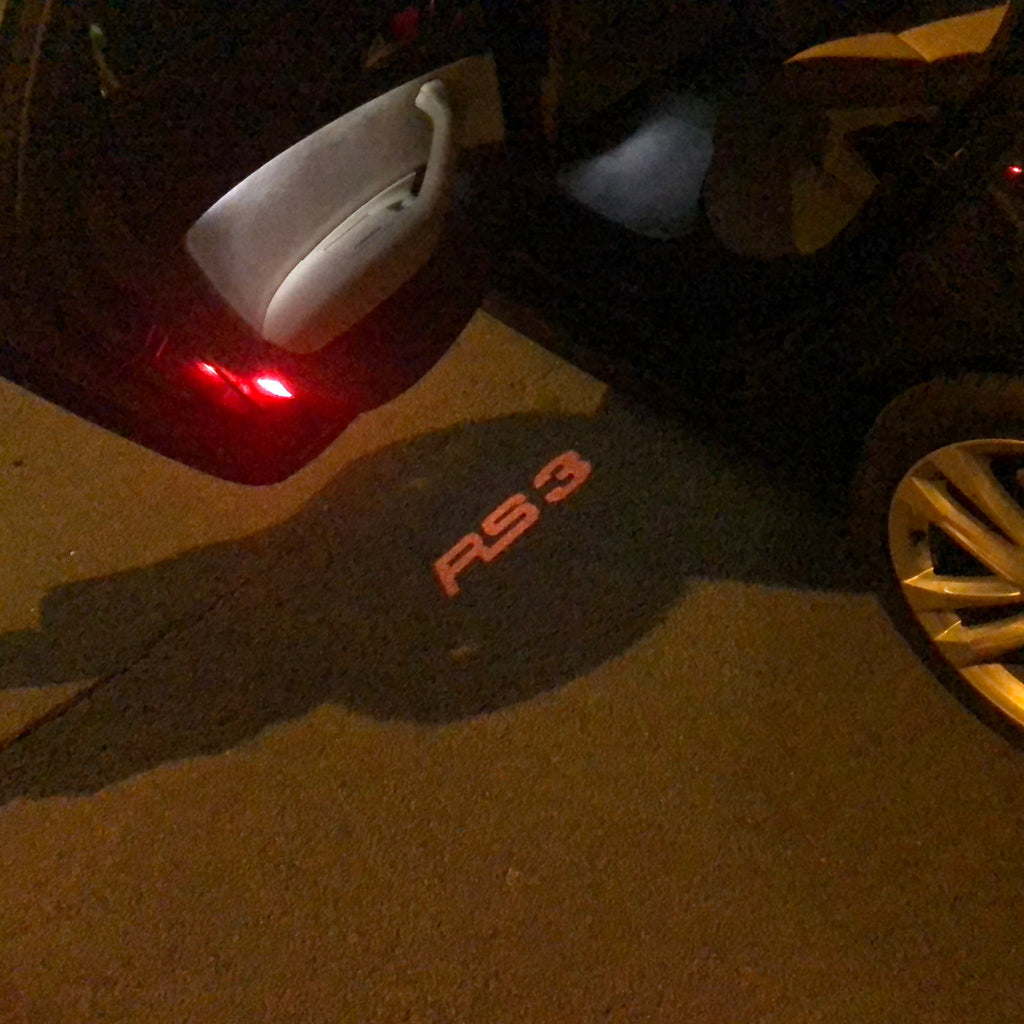 AUDI LOGO PROJECTOT LIGHTS Nr.139 (quantité 1 = 2 Logo Films /2 feux de porte)
