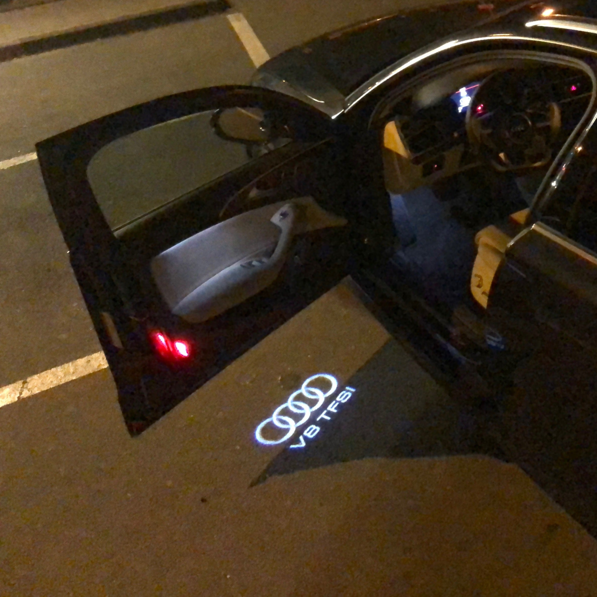 AUDI LOGO PROJECTOT LIGHTS Nr.105 (الكمية 1 = 2 Logo Films /2 أضواء الباب)