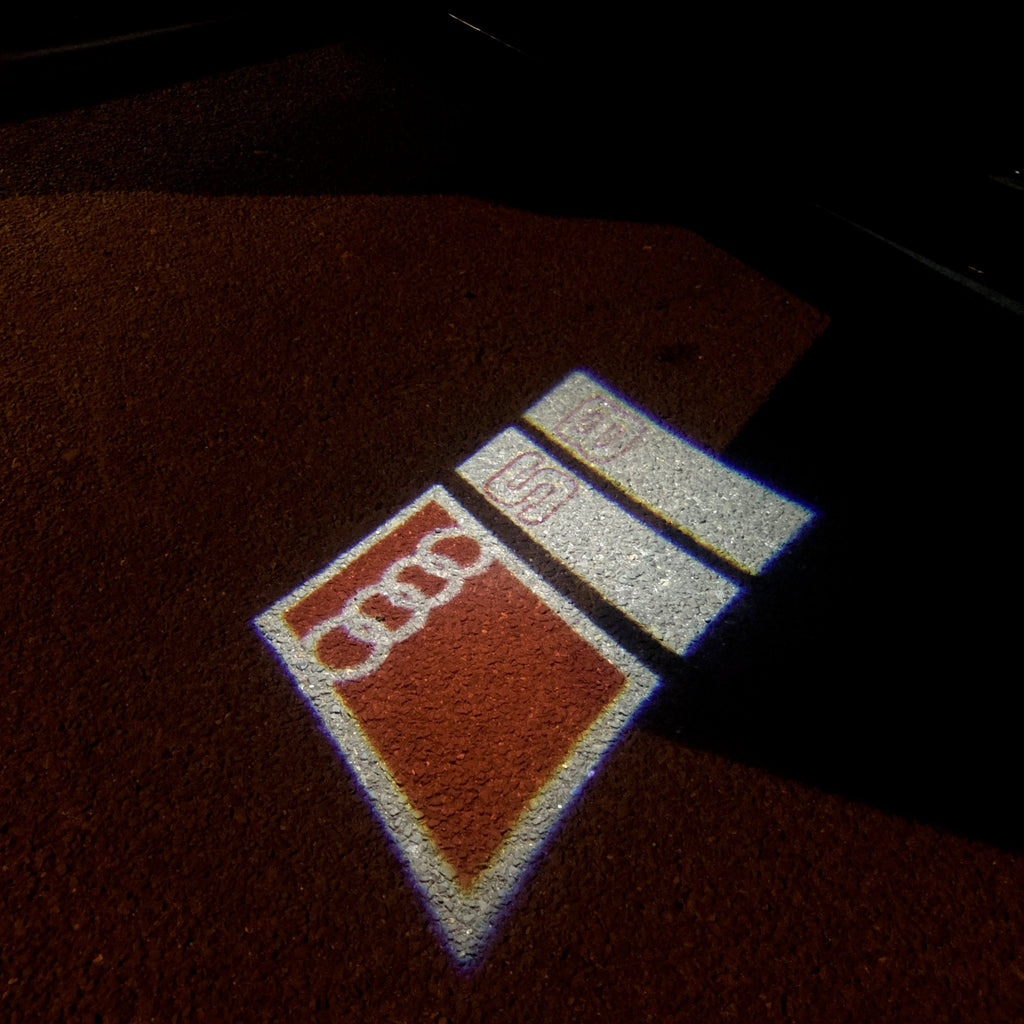 AUDI LOGO PROJECTOT LIGHTS Nr.103 (Menge 1 = 2 Logofolien /2 Türleuchten)