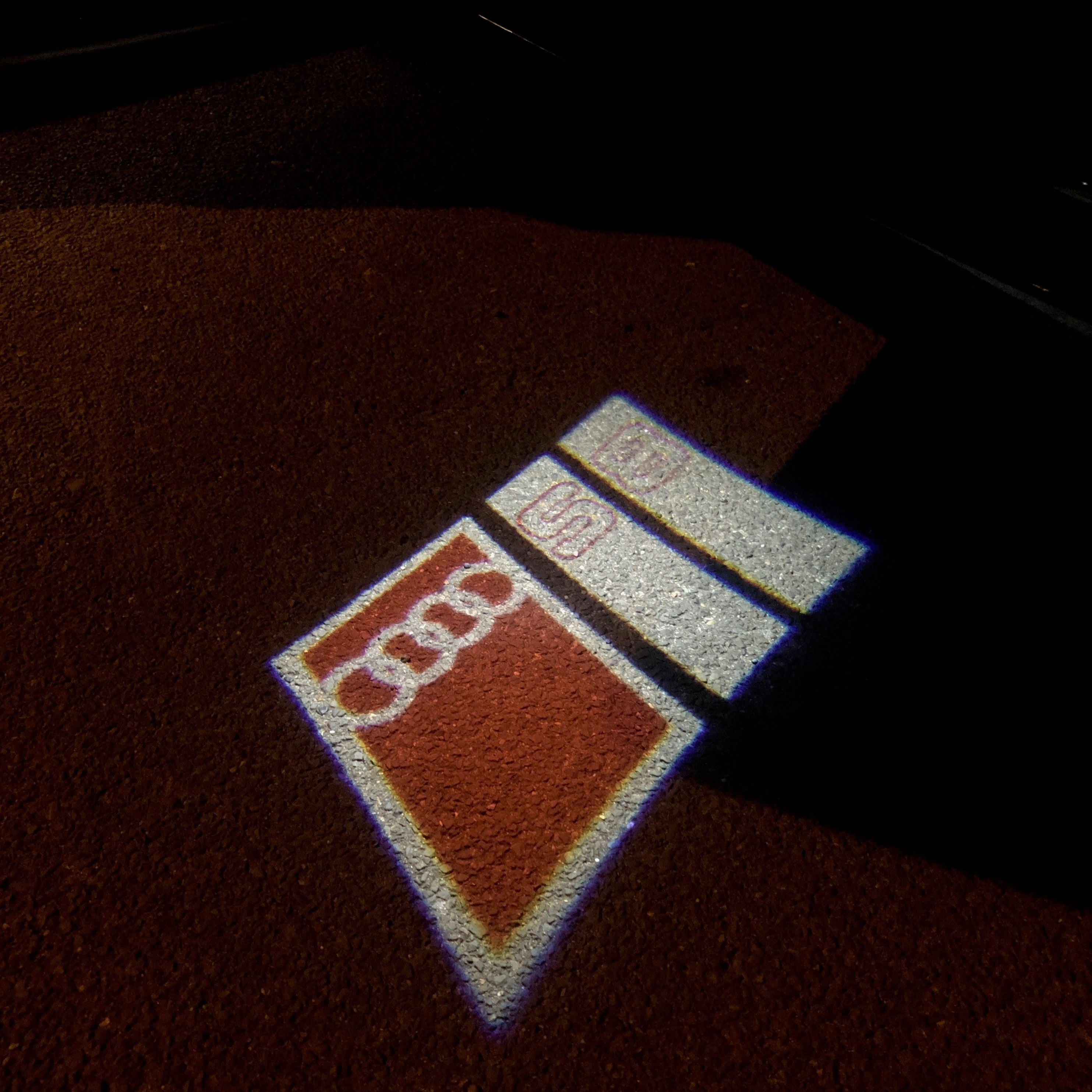 AUDI LOGO PROJECTOT LIGHTS Nr.103 (Menge 1 = 2 Logofolien /2 Türleuchten)