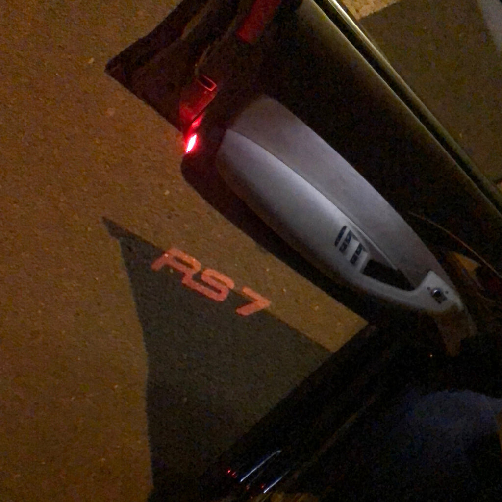 AUDI LOGO PROJECTOT LIGHTS Nr.142 (الكمية 1 = 2 Logo Films /2 أضواء الباب)
