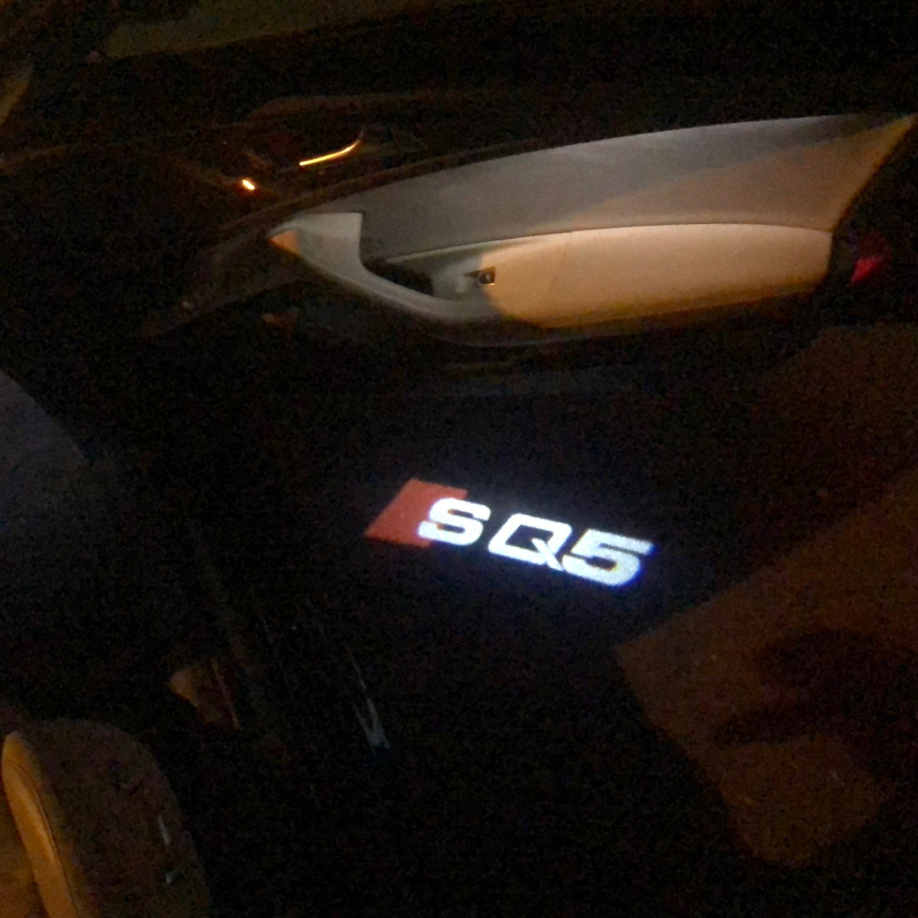 AUDI LOGO PROJECTOT LIGHTS Nr.58 (Menge 1 = 2 Logofolien /2 Türleuchten)