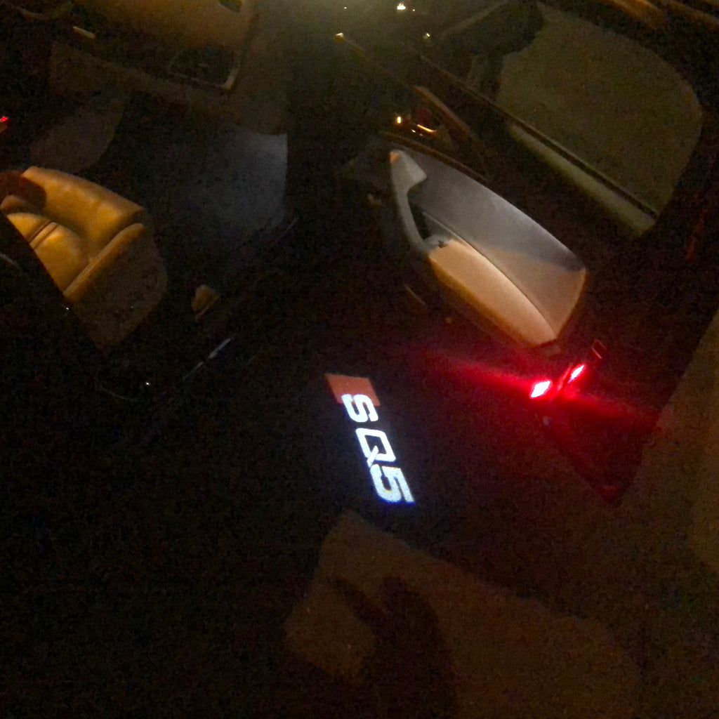 AUDI LOGO PROJECTOT LIGHTS Nr.58 (Menge 1 = 2 Logofolien /2 Türleuchten)