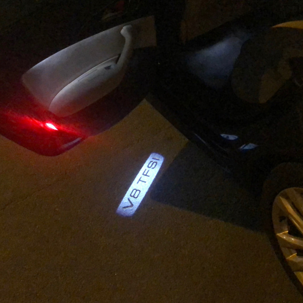 AUDI LOGO PROJECTOT LIGHTS Nr.106 (الكمية 1 = 2 Logo Films /2 أضواء الباب)