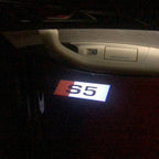 AUDI LOGO PROJECTOT LIGHTS Nr.132 (quantità 1 = 2 Logo Films /2 luci porta)