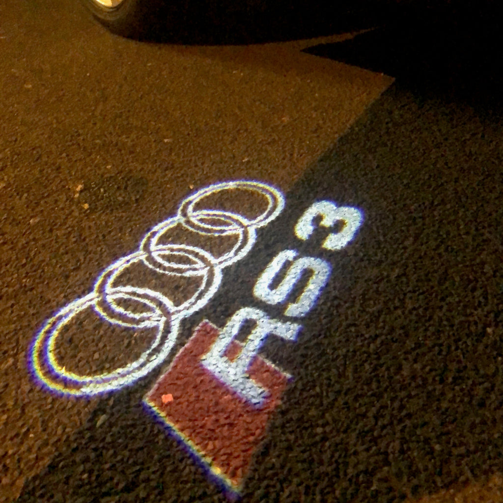 AUDI LOGO PROJECTOT LIGHTS Nr.128 (الكمية 1 = 2 شعار الأفلام / 2 أضواء الباب)