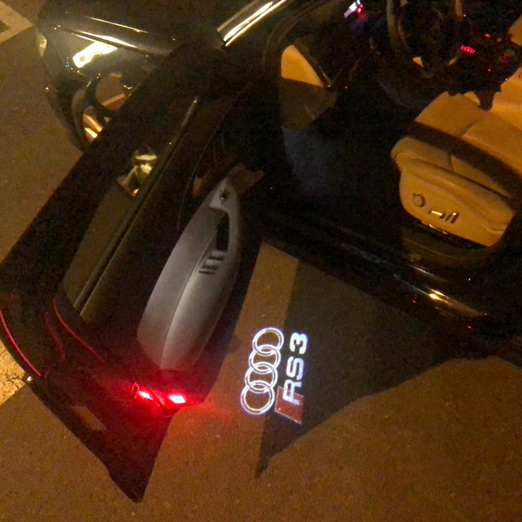 AUDI LOGO PROJECTOT LIGHTS Nr.128 (الكمية 1 = 2 شعار الأفلام / 2 أضواء الباب)