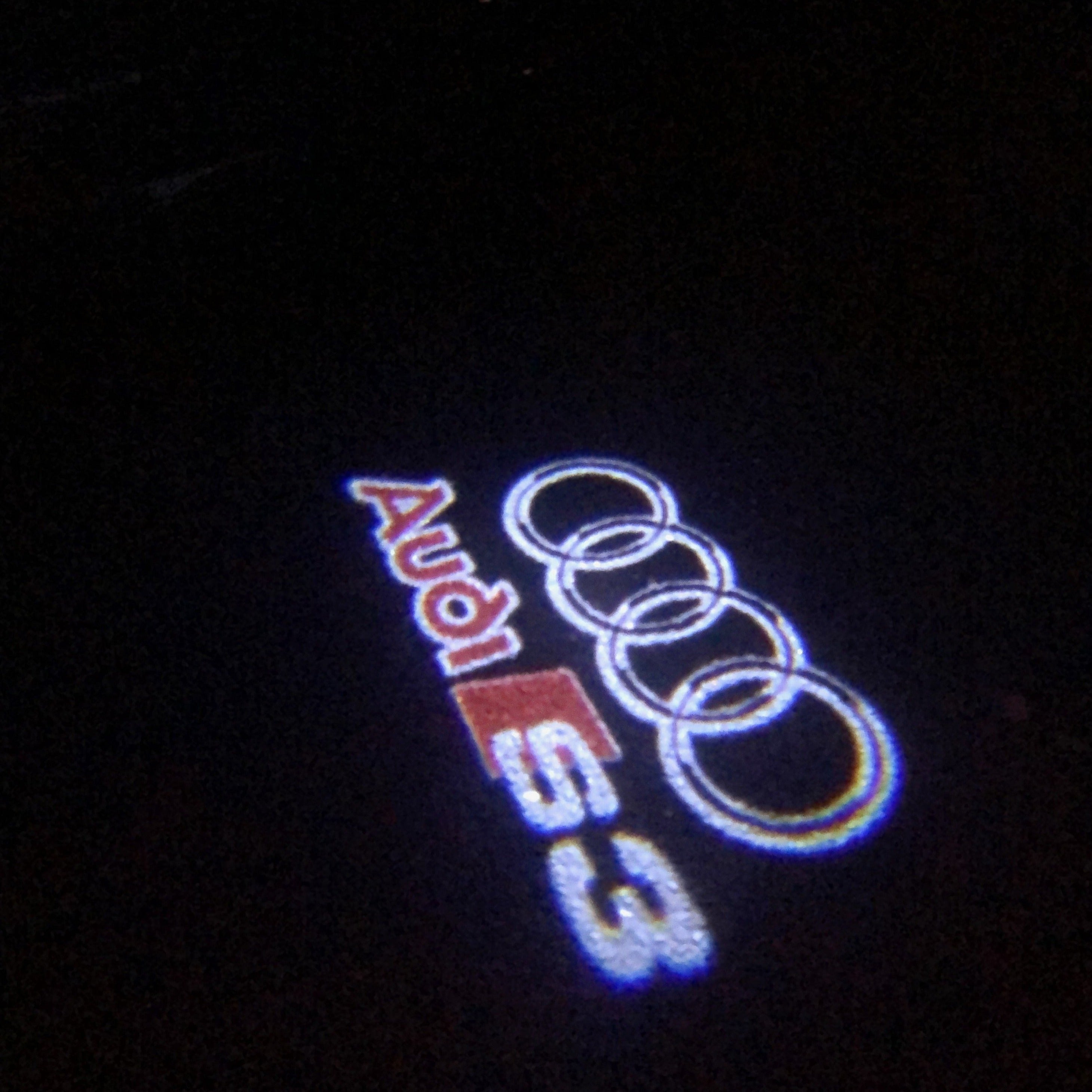 AUDI LOGO PROJECTOT LIGHTS Nr.33 (Menge 1 = 2 Logofolien /2 Türleuchten)