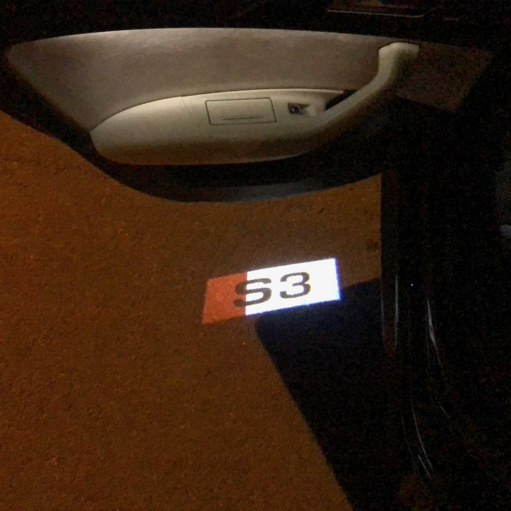 AUDI LOGO PROJECTOT LIGHTS Nr.129 (quantità 1 = 2 Logo Films /2 luci porta)
