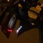 LUCES DE PROYECTOR LOGO AUDI Nr.57 (cantidad 1 = 2 películas con logotipo / 2 luces de puerta)