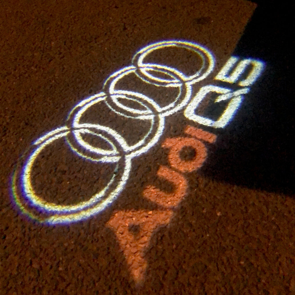 AUDI LOGO PROJECTOT LIGHTS Nr.48 (Menge 1 = 2 Logofolien /2 Türleuchten)